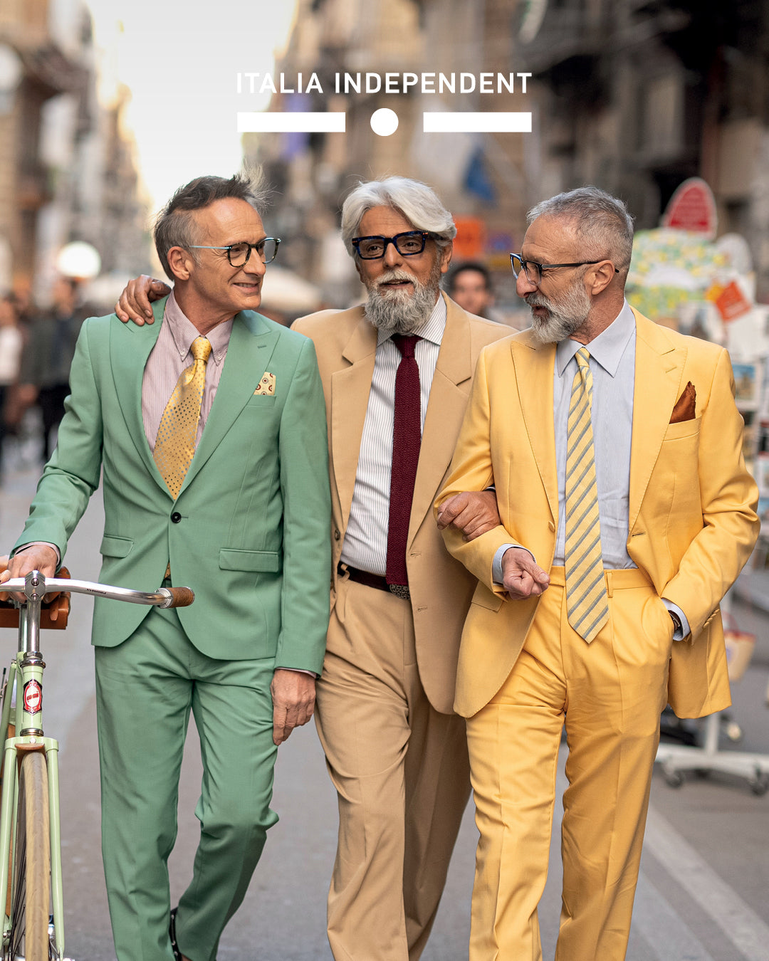 Italia Independent eyewear campaign with male models wearing eyeglasses, walking in urban city setting – luxury men’s and eyewear fashion photography.